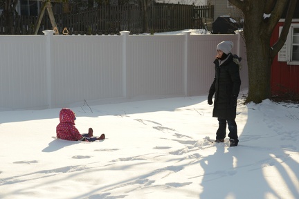 Erynn throwing Greta into the snow2